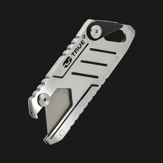 True Utility simply means ‘Really Useful’. Our collection of pocket tools are all about making sure you’re ready for whatever, while still being able to live light. Boxcutter securely holds one standard utility blade within its slimline frame. The integrated sprung blade lock button holds the blade safely in place when in use; the blade can be easily replaced when needed. Doubles as a bottle opener and a flat head screwdriver