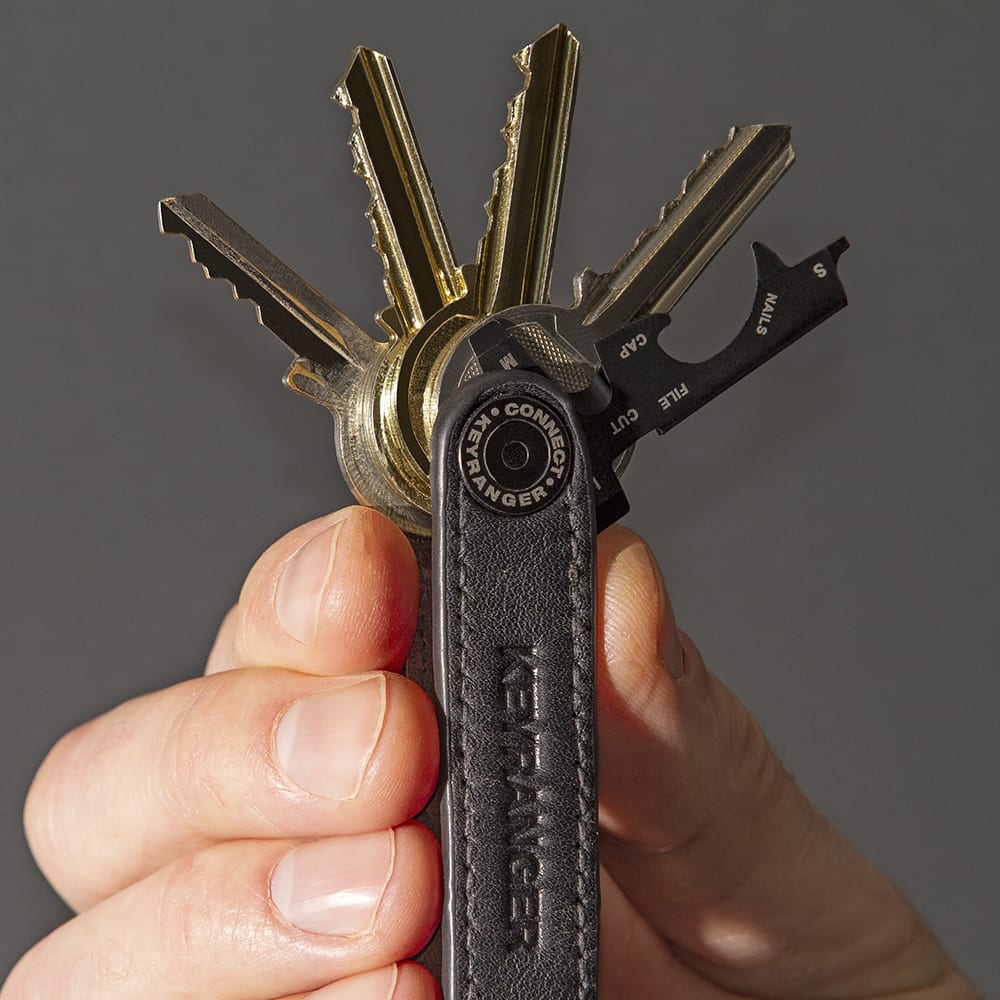 True Utility simply means ‘Really Useful’. Our collection of pocket tools are all about making sure you’re ready for whatever, while still being able to live light. The Keyranger is the slimmest key securing system on the market. With a premium cowhide black leather key fob and a contrasting tan leather interior, Keyranger holds your keys flat and in order.