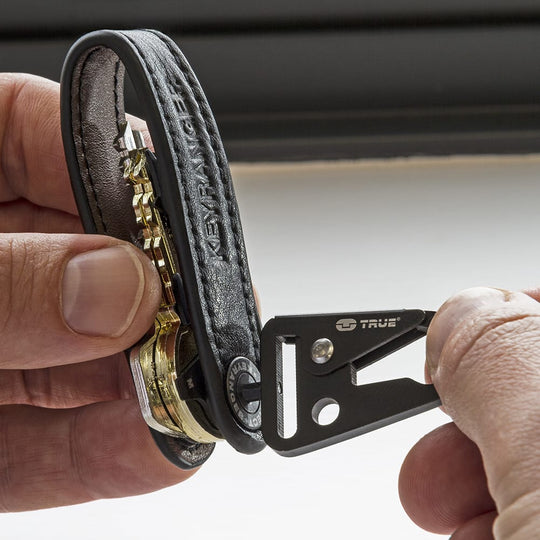 True Utility simply means ‘Really Useful’. Our collection of pocket tools are all about making sure you’re ready for whatever, while still being able to live light. The Keyranger is the slimmest key securing system on the market. With a premium cowhide black leather key fob and a contrasting tan leather interior, Keyranger holds your keys flat and in order.